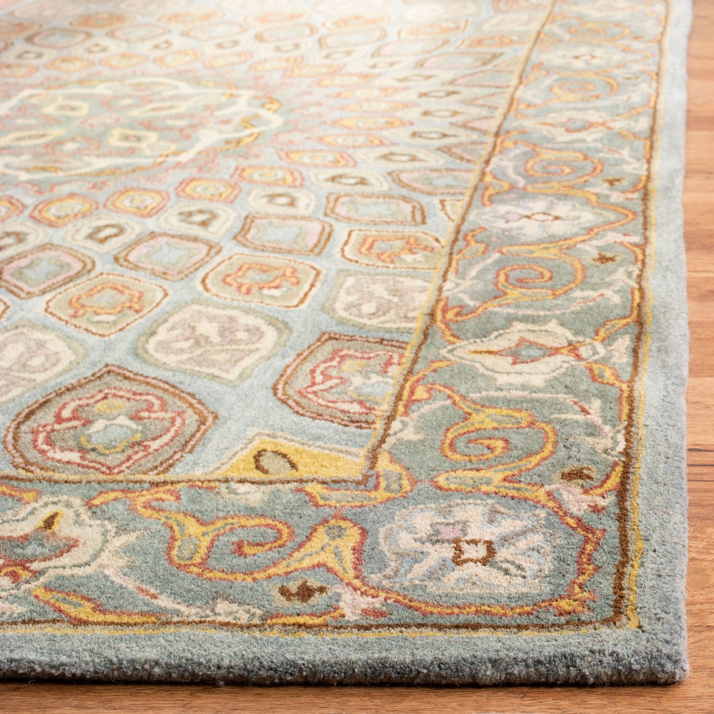 SAFAVIEH Handmade Heritage Wayfarer Traditional Oriental Wool Rug