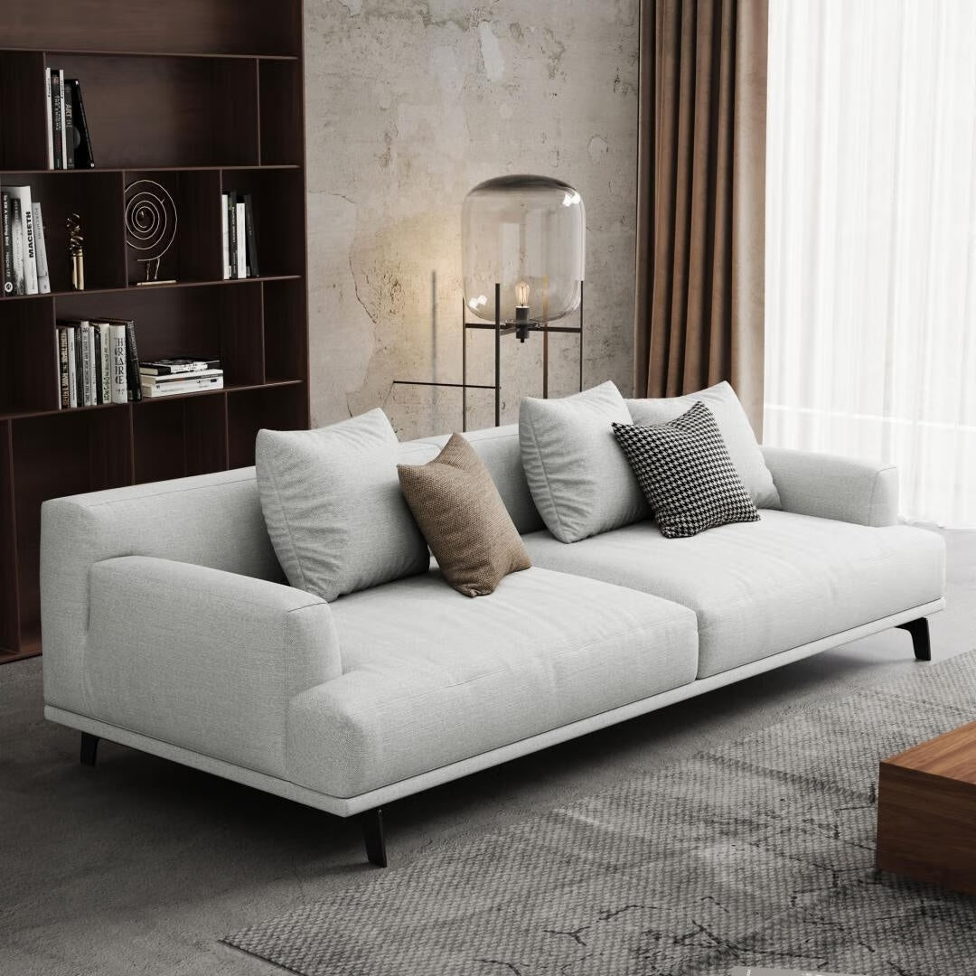 Canapé droit en tissu beige à accoudoirs carrés