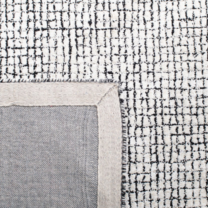 SAFAVIEH Handmade Abstract Marikka Modern Viscose Rug