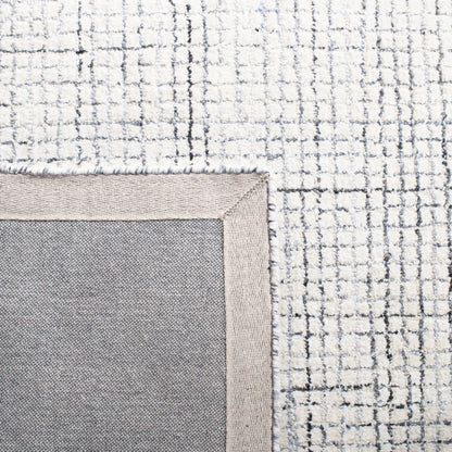 SAFAVIEH Handmade Abstract Marikka Modern Viscose Rug