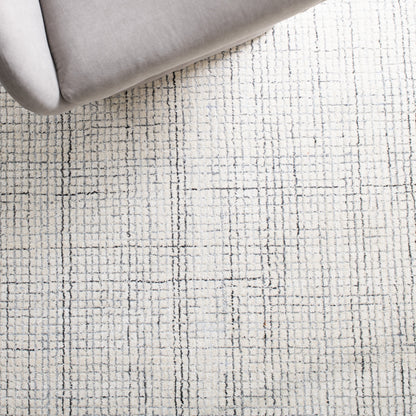 SAFAVIEH Handmade Abstract Marikka Modern Viscose Rug
