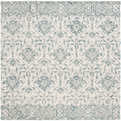 SAFAVIEH Handmade Dip Dye Elvedina Floral Wool Rug