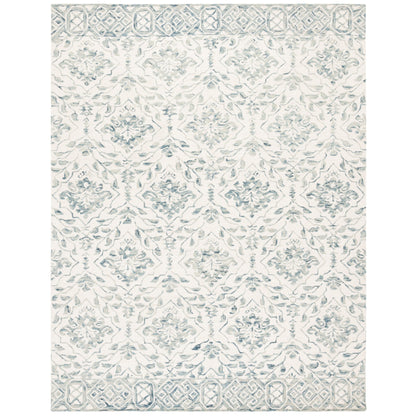 SAFAVIEH Handmade Dip Dye Elvedina Floral Wool Rug