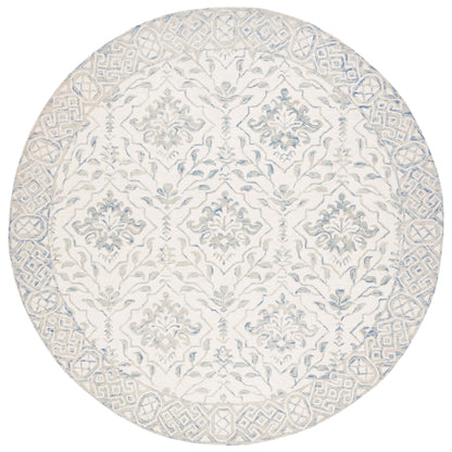 SAFAVIEH Handmade Dip Dye Elvedina Floral Wool Rug
