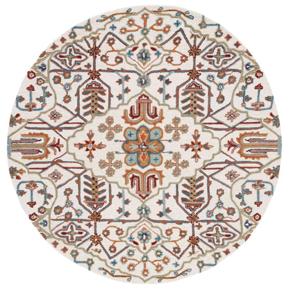 SAFAVIEH Handmade Heritage Snjolaug Floral Wool Rug