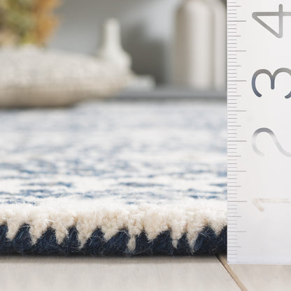SAFAVIEH Handmade Micro-Loop Lutetia Wool Rug