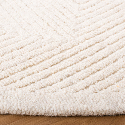 SAFAVIEH Handmade Textural Nigina Wool Rug