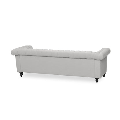 Canapé 3 places, tissu gris capitonné, 210 cm, accoudoirs évasés et roulés