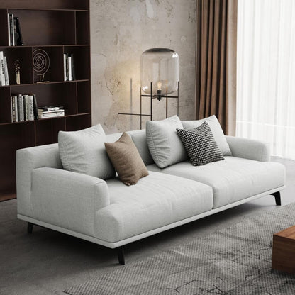 Canapé droit en tissu beige à accoudoirs carrés