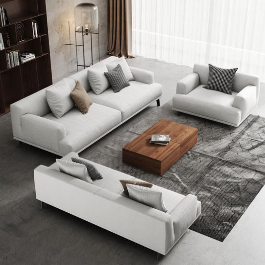 Canapé droit en tissu beige à accoudoirs carrés
